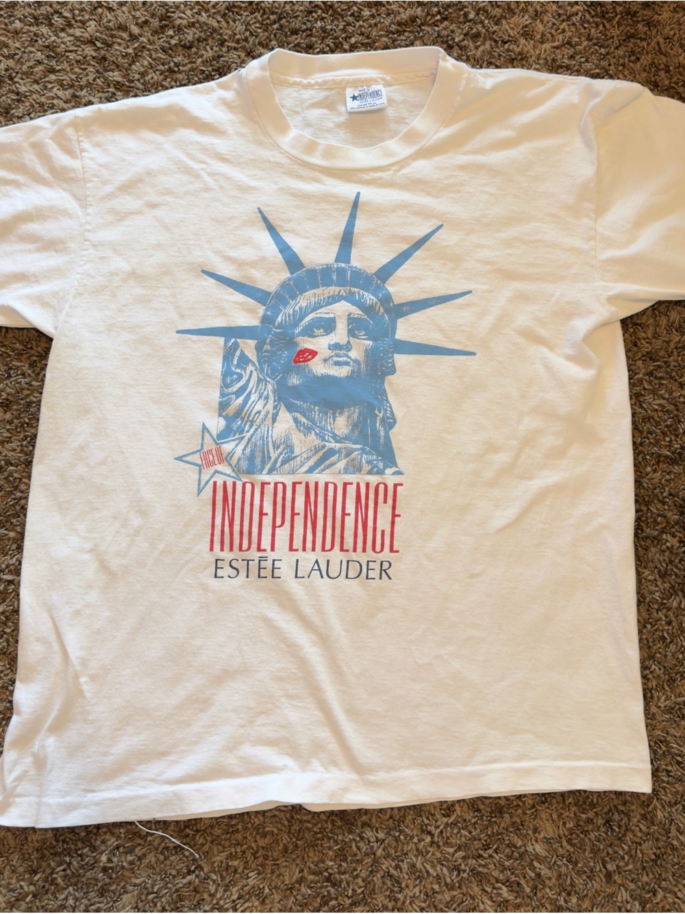 Estee Lauder White Tee with Blue Statue of Liberty and Red Accents
